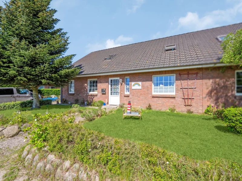 Hausansicht - Haus kaufen in Steinfeld - Großzügige Doppelhaushälfte mit Galerie in Steinfeld