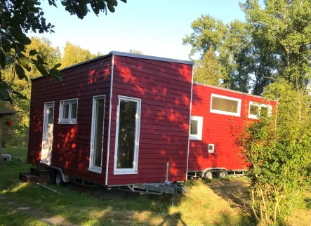 Ansicht 1 - Haus kaufen in Loxstedt - Luxuriöse Tiny Häuser im Doppelpack: Einzigartiges Wohnen auf kleinem Raum