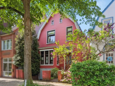 Titelbild - Haus kaufen in Bremen - Gemütliches Einfamilienhaus mit 7 Zimmern und Garten in Bremen-Vegesack