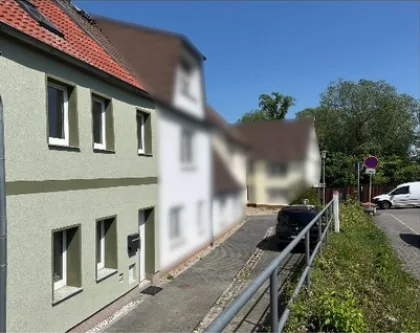 Hausansicht - Haus kaufen in Merseburg - Direkt einziehen! Modernisiertes Reihenmittelhaus in Merseburg 