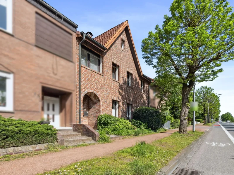 Titelbild - Haus kaufen in Haltern am See - Attraktives Zweifamilienhaus mit Ausbaureserve in Haltern am See