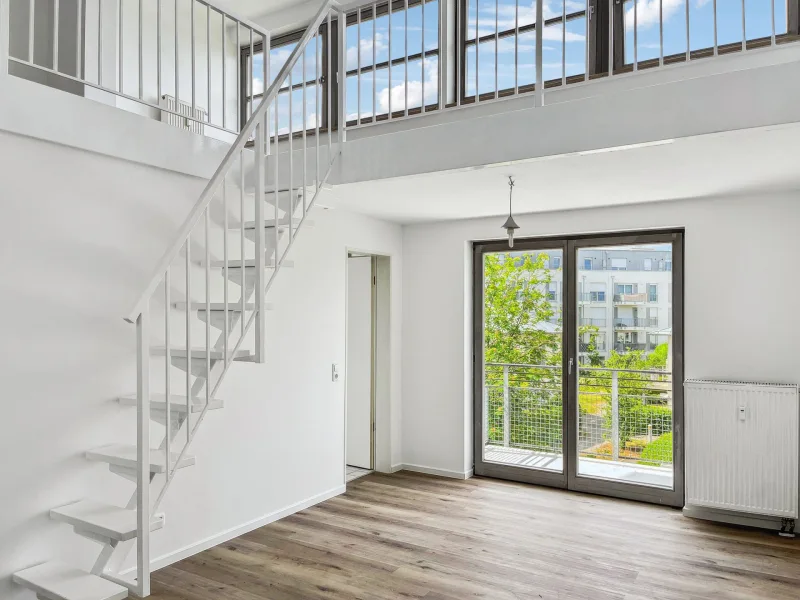 Maisonettewohnung - Titelbild - Wohnung kaufen in Schönefeld - 1-Zimmer-Maisonett-Apartment mit Balkon und Tiefgaragenstellplatz in Schönefeld 