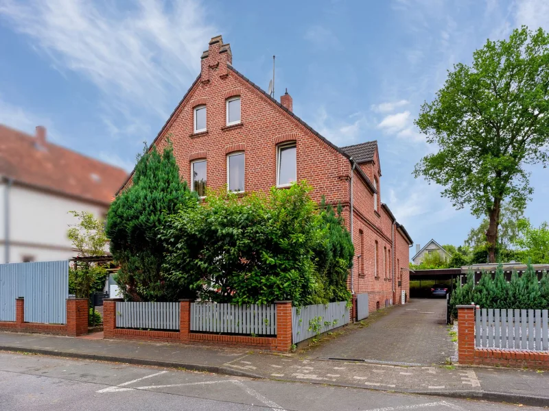 Hausansicht - Wohnung kaufen in Gütersloh - Moderne 3-Zimmer-Eigentumswohnung mit Garten in zentrumsnaher Lage von Gütersloh