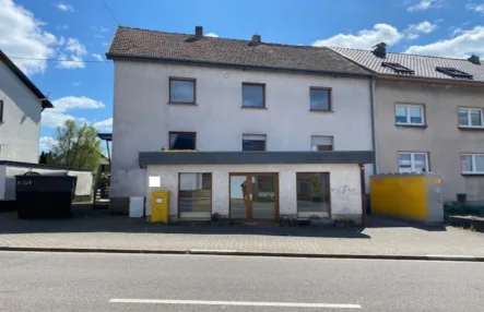 Titelbild - Haus kaufen in Heusweiler - Zweifamilienhaus in Heusweiler