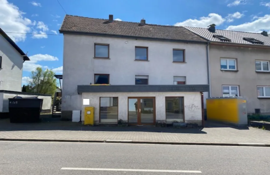 Titelbild - Haus kaufen in Heusweiler - Zweifamilienhaus in Heusweiler