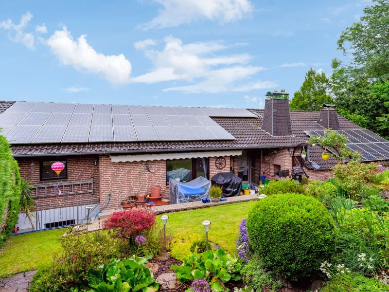 titelbild - Haus kaufen in Paderborn - Individuelles Einfamilienhaus mit Platz für die Familie in Neuenbeken