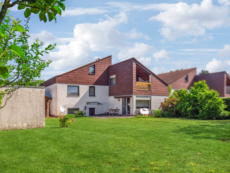 Titelbild - Haus kaufen in Ulm - Charmantes Einfamilienhaus mit Einliegerwohnung in begehrter Lage Ulm-Wiblingen