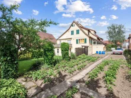 Titelbild - Haus kaufen in Walddorfhäslach - Großzügiges Einfamilienhaus in Walddorf: Platz genug auch für zwei Familien