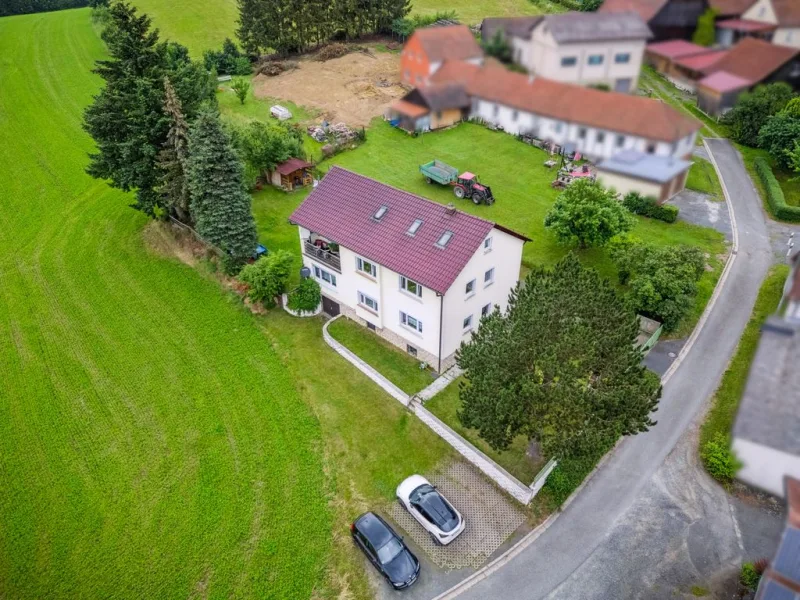 Objektansicht - Haus kaufen in Ludwigschorgast - Vermietetes Zweifamilienhaus in ländlicher Lage von Ludwigschorgast