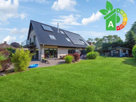 Titelbild - Haus kaufen in Handewitt - Modernes Einfamilienhaus mit zwei Einliegerwohnungen in traumhafter Lage am Naturschutzgebiet