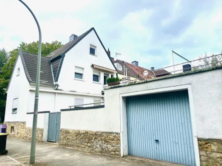 Titel - Haus kaufen in Osnabrück - Wohnen und Gewerbe kombinieren: Mehrfamilienhaus in Osnabrück Schinkel mit 2 freien Einheiten