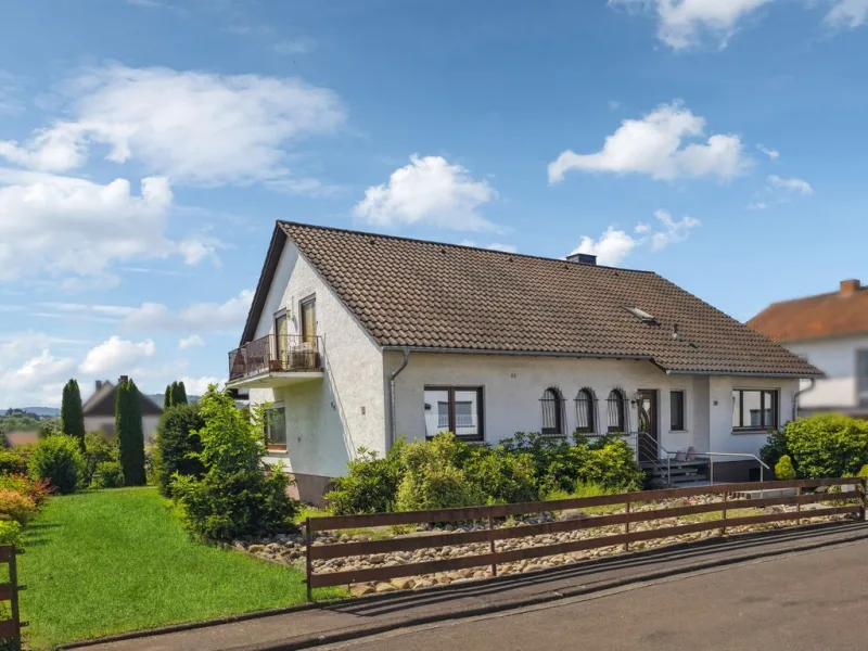 Außenansicht 1 - Haus kaufen in Lollar - Charmantes Einfamilienhaus in Lollar