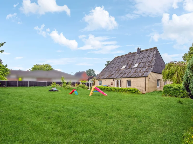 Headphoto - Haus kaufen in Itzehoe - Familienidylle und Bauplatz: Einfamilienhaus in Itzehoe/Wellenkamp