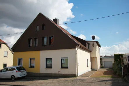 Strassenansich - Haus kaufen in Spiesen-Elversberg - Doppelhaushälfte mit wunderschönem Garten und Garage in Spiesen-Elversberg - sofort bezugsfrei!