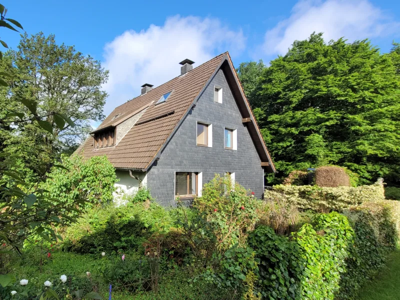 Titelbild - Haus kaufen in Wuppertal - Einfamilienhaus mit Option zum Mehrgenerationenhaus in bevorzugter Lage von Wuppertal-Vohwinkel