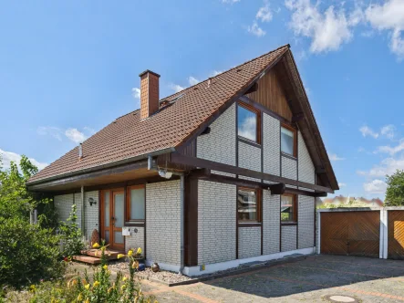 Titelbild - Haus kaufen in Rödinghausen - Familientraum mit großem Garten in Rödinghausen