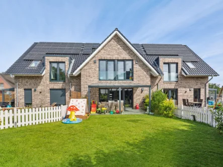 Außenansicht - 1 - Haus kaufen in Buxtehude - Ihr Kfw 40 Traumhaus für junge Familien in Buxtehude – Modernes Wohnen in naturnaher Umgebung