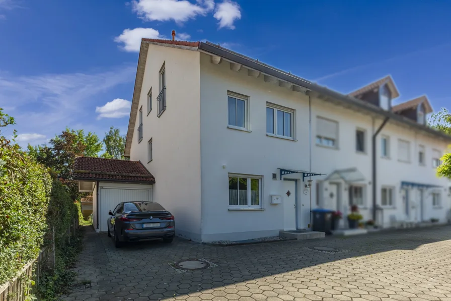 Ansicht - Haus kaufen in Landsberg am Lech - Landsberg am Lech: Charmantes Reihenendhaus perfekt für Familien mit Garage, Stellplatz und Garten