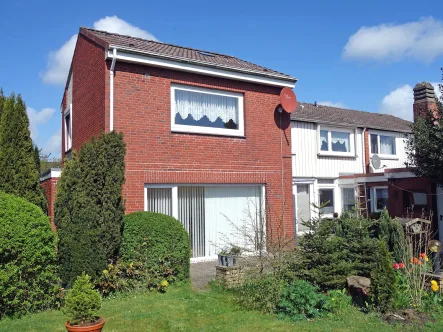 Headphoto - Haus kaufen in Eddelak - Große zweigeschossige Doppelhaushälfte mit Anbau in ruhiger rückwärtiger Sackgassenlage in Eddelak 