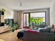 Wohnzimmer mit Balkon