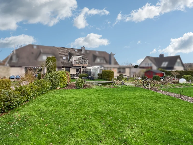 Rückansicht - Haus kaufen in Altenholz - Gepflegtes Reihenmittelhaus mit Einliegerwohnung in Sackgassenlage am Feldrand in Altenholz