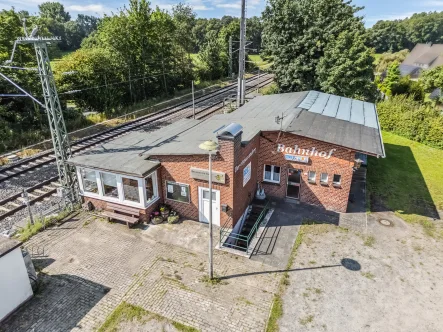 Titelbild - Haus kaufen in Rheine - Ehemaliger Bahnhof mit separatem Baugrundstück plus viele Nutzungsmöglichkeiten in Rheine-Rodde