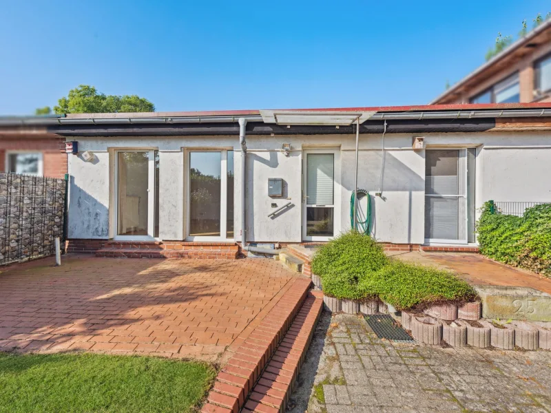 Hausansicht 1 - Haus kaufen in Freren - Charmantes Reihenmittelhaus mit eigenem Garten in Freren-Suttrup 