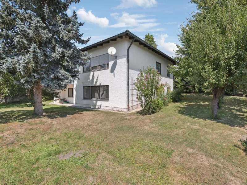 Titelbild - Haus kaufen in Wurmsham - Geräumiges Einfamilienhaus mit Einliegerwohnung in idyllischer Lage von Wurmsham