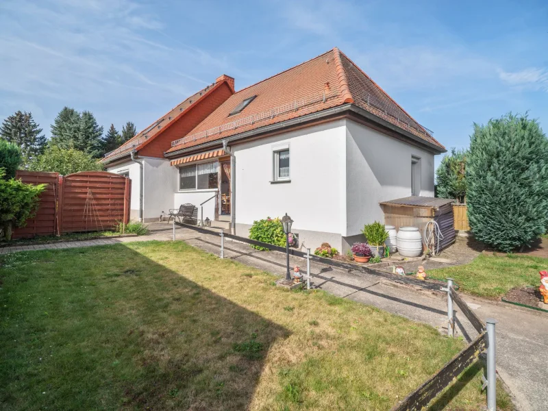 Haus mit Ausbaureserve - Haus kaufen in Apolda - Einfamilienhaus mit gepflegtem Grundstück in Apolda