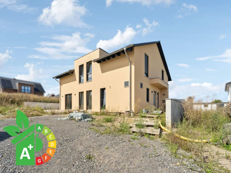 Titelbild - Haus kaufen in Bad Münder am Deister - Modern und energieeffizient wohnen - Einfamilienhaus in begehrter Lage von Bad Münder - Bakede