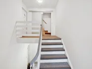 Treppe zur Wohnung im DG