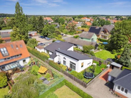 Außenansicht - Wohnung kaufen in Burgwedel (Wettmar) - Eigentumswohnung als moderne Haushälfte! Naherholungsfaktor in  Wettmar - Großburgwedel