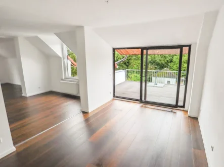 Titelbild - Wohnung kaufen in Essen - 3,5-Zimmer-Maisonettewohnung mit Blick auf die Ruhr in Steele