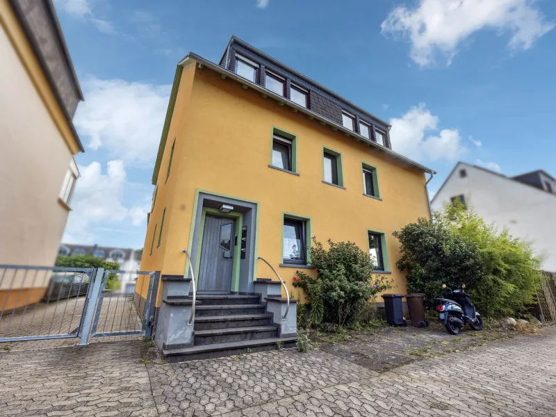 Eigentumswohnung mit Garten  - Wohnung kaufen in Koblenz - 3-Zimmer-Eigentumswohnung mit Gartenanteil in Koblenz 