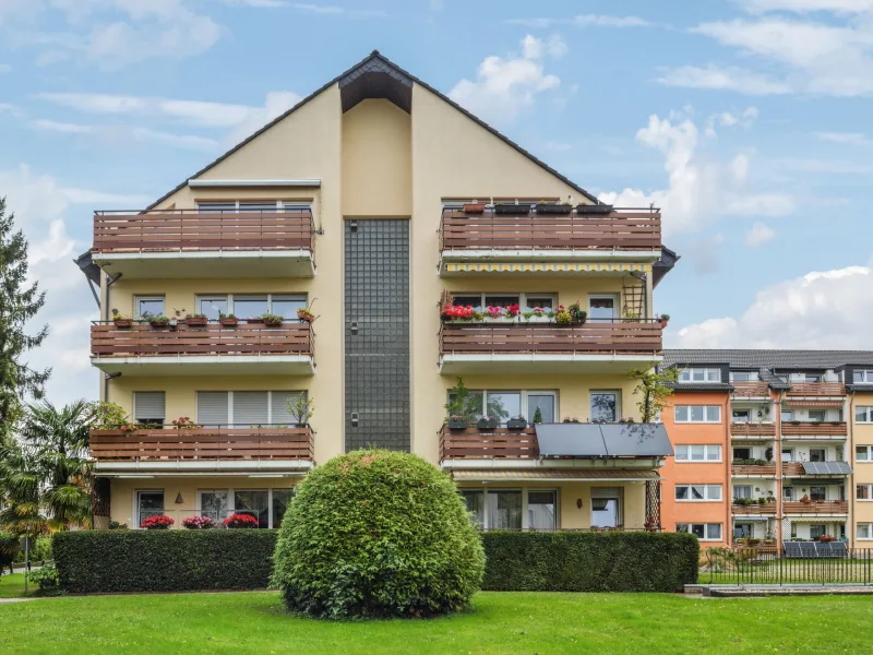 Rückansicht - Wohnung kaufen in Köln - Gepflegtes Apartment mit Tiefgaragenstellplatz und Balkon in Porz-Zündorf