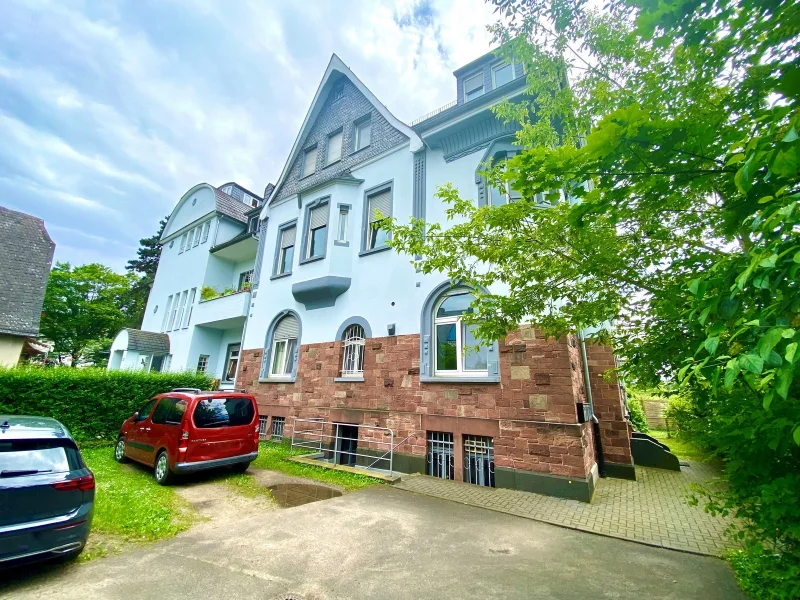 Titel - Wohnung kaufen in Frankfurt am Main - Altbau, vermietete 3-Zimmer-Erdgeschoss-Wohnung in Frankfurt