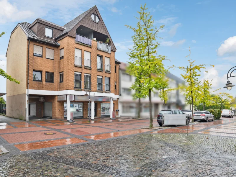 Hausansicht - Wohnung kaufen in Bergkamen - Gemütliche 3-Zimmer-Dachgeschosswohnung mit Loggia vermietet im Herzen von Bergkamen