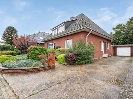 Titelbild - Haus kaufen in Rheine - Geräumiges und gut gepflegtes Einfamilienhaus mit vielen Extras in ruhiger Lage vom Rheine Rodde!