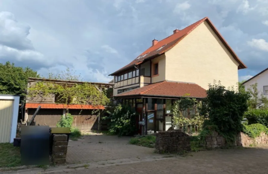 Titelfoto - Haus kaufen in Kirkel - Bald in den eigenen vier Wänden wohnen im Einfamilienhaus in Kirkel in ruhiger Lage