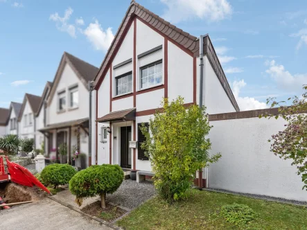 Titelbild - Haus kaufen in Ratingen - Ratingen - Geräumiges Familienhaus mit wunderschönem Garten und Garage