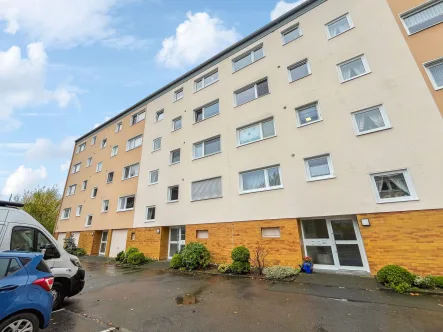 Titelbild - Wohnung kaufen in Wuppertal - Charmante Eigentumswohnung im Hochparterre mit Balkon und Gartenmitbenutzung in Wuppertal