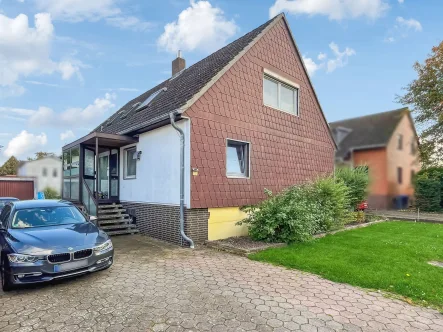 Titelbild - Haus kaufen in Lengede - Großzügiges Einfamilienhaus mit ca.174 m² Wohnfläche in Woltwiesche - Lengede