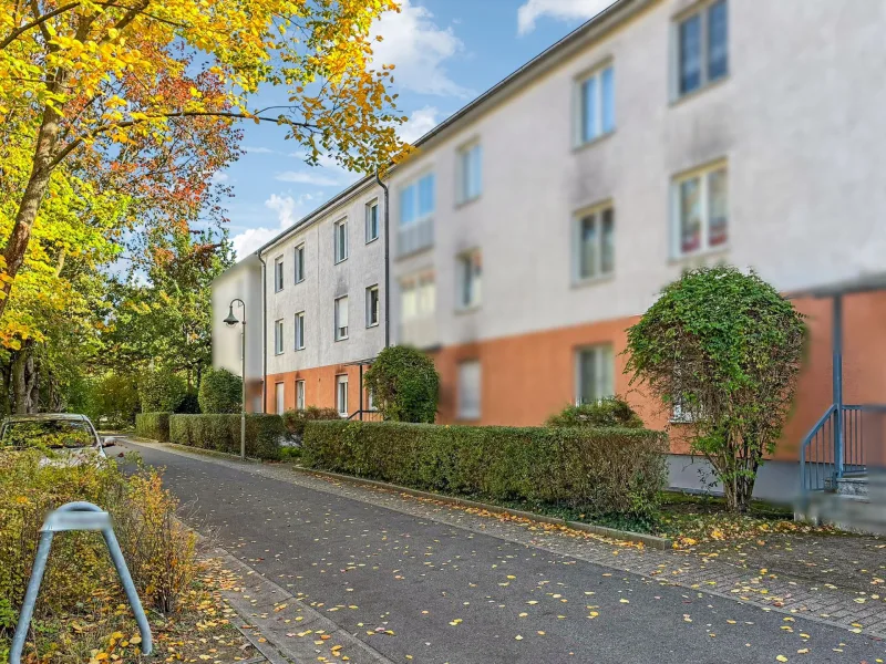 Titelbild - Wohnung kaufen in Schöneiche bei Berlin - Vermietete 3-Zimmer-Maisonettewohnung in Schöneiche bei Berlin