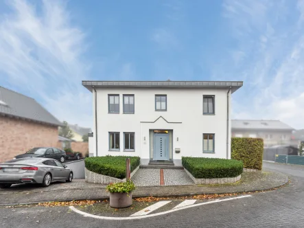 Titelbild - Haus kaufen in Waldfeucht - Traumhaftes Einfamilienhaus mit großzügigem Eckgrundstück in Waldfeucht