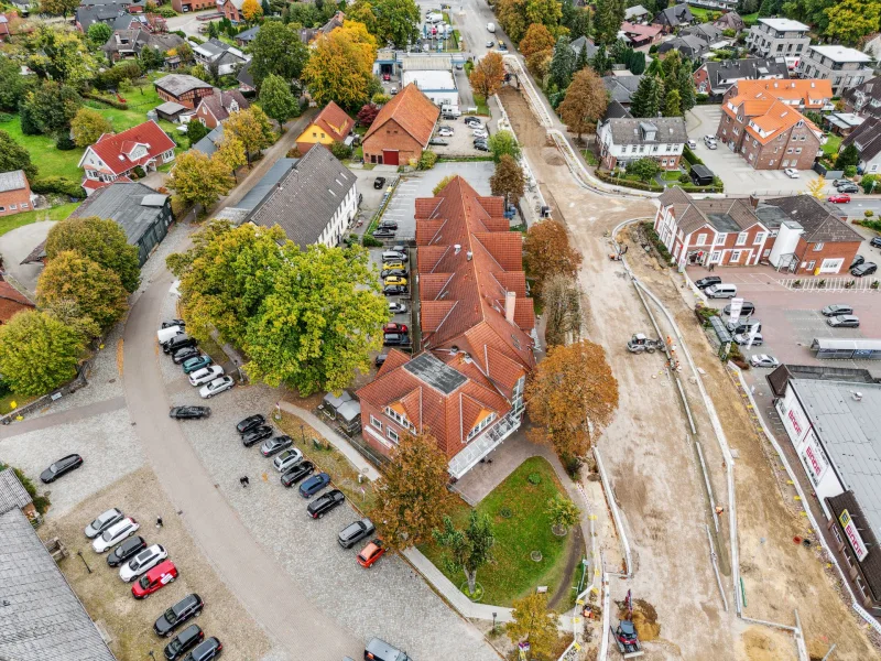 Titelbild - Zinshaus/Renditeobjekt kaufen in Tostedt - Attraktives Wohn-/ und Geschäftshaus mit vielen Parkmöglichkeiten im Zentrum von Tostedt