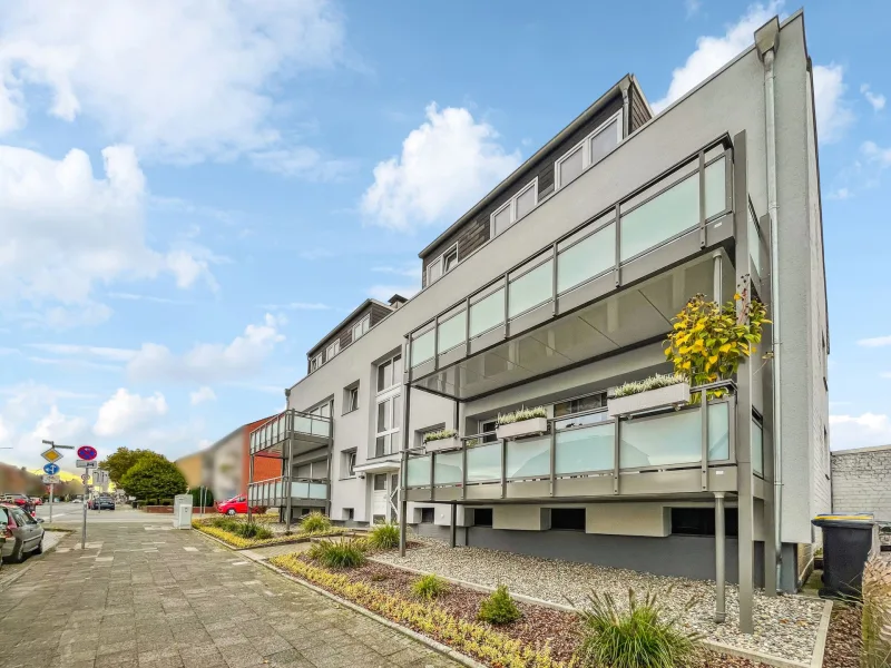 Objektansicht - Wohnung kaufen in Bottrop - Energetisch saniert: Geräumige 3-Zimmer-Wohnung mit Balkon und Garage in Bottrop-Fuhlenbrock