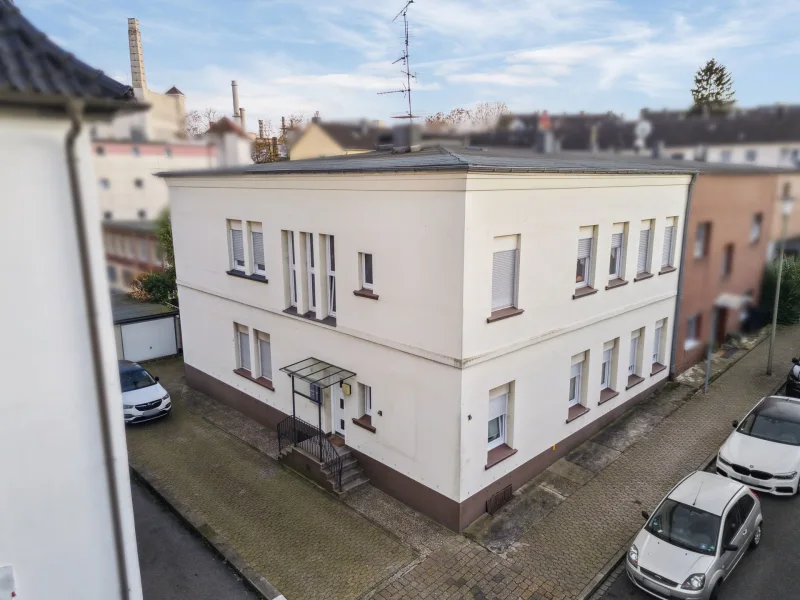 Außenansicht - Haus kaufen in Mettmann - Saniertes Mehrfamilienhaus mit 4 Einheiten und 2 Garagen mit ca. 391,8 m² Gesamtfläche in Mettmann