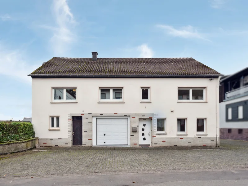 Hausansicht - Haus kaufen in Binsfeld - Zum neuen Jahr im neuen Zuhause: Freistehendes Raumwunder mit vielseitigem Potenzial in Binsfeld