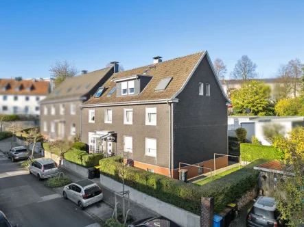 Titel - Haus kaufen in Mettmann - Gepflegtes Mehrfamilienhaus mit 5 Einheiten und 7 Garagen mit ca. 406 m² Gesamtfläche in Mettmann