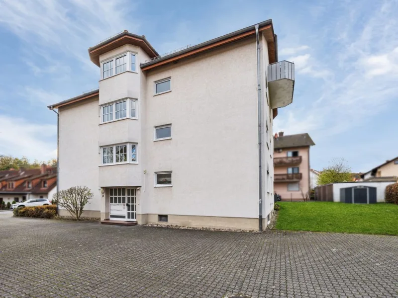 Titelbild - Wohnung kaufen in Goldbach - Charmante 3-Zimmer-Eigentumswohnung in ruhiger Lage von Goldbach